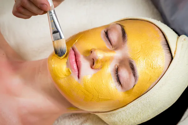 depositphotos_37609107 stock photo gold facial mask